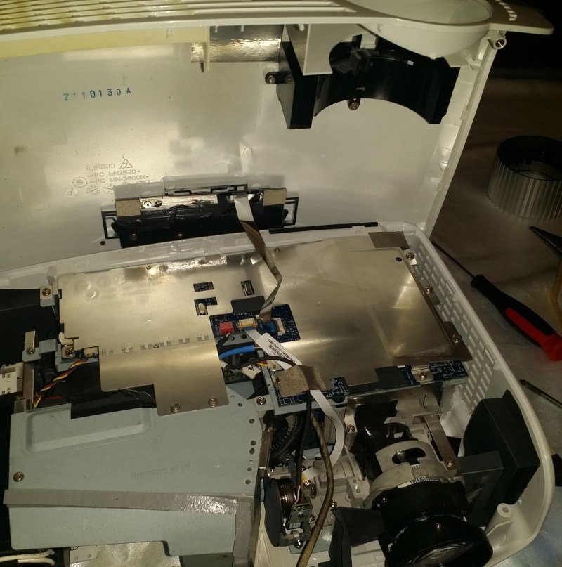 Case Open - Avoid tearing ribbon cable connected to button panel on top case